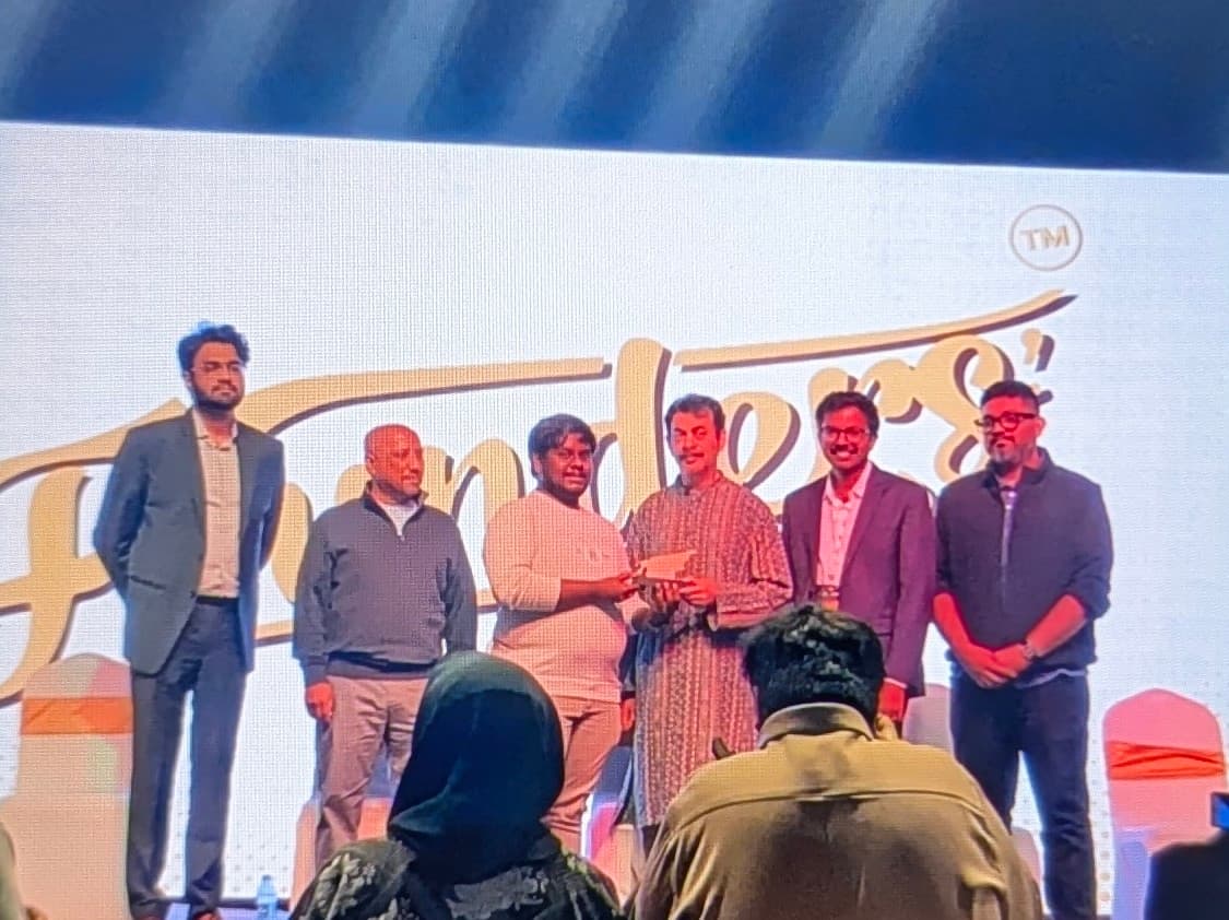Amar Reddy accepting Social Enterprise Startup Award for community-driven innovation